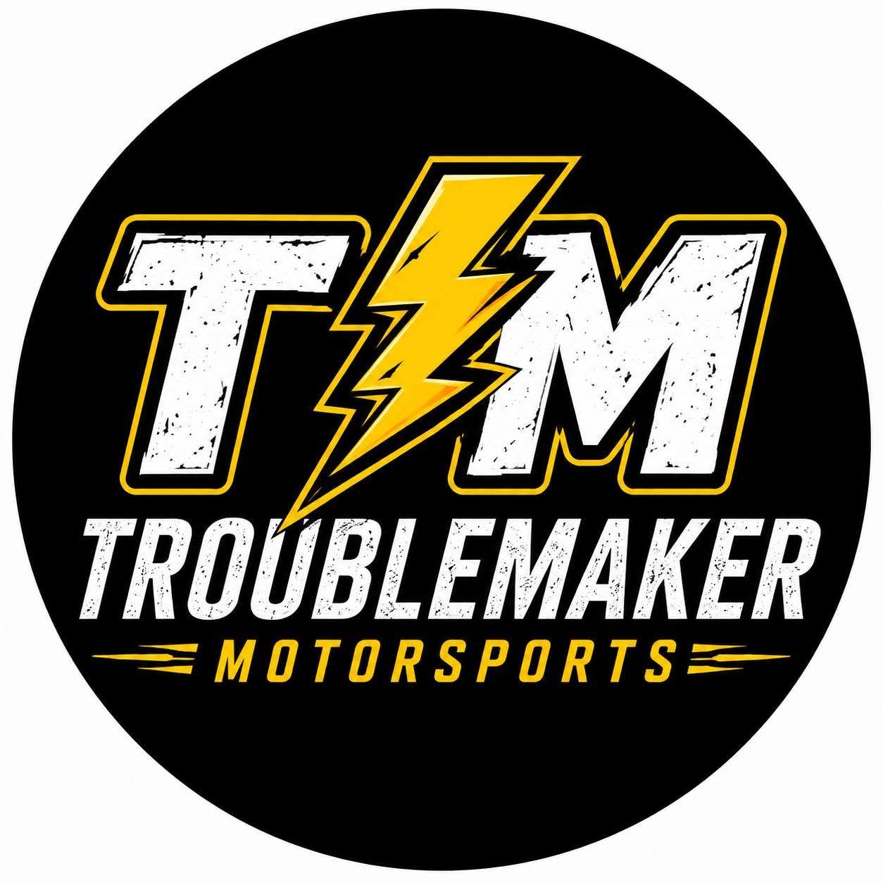 Troublemaker Motosports black, white and yellow logo